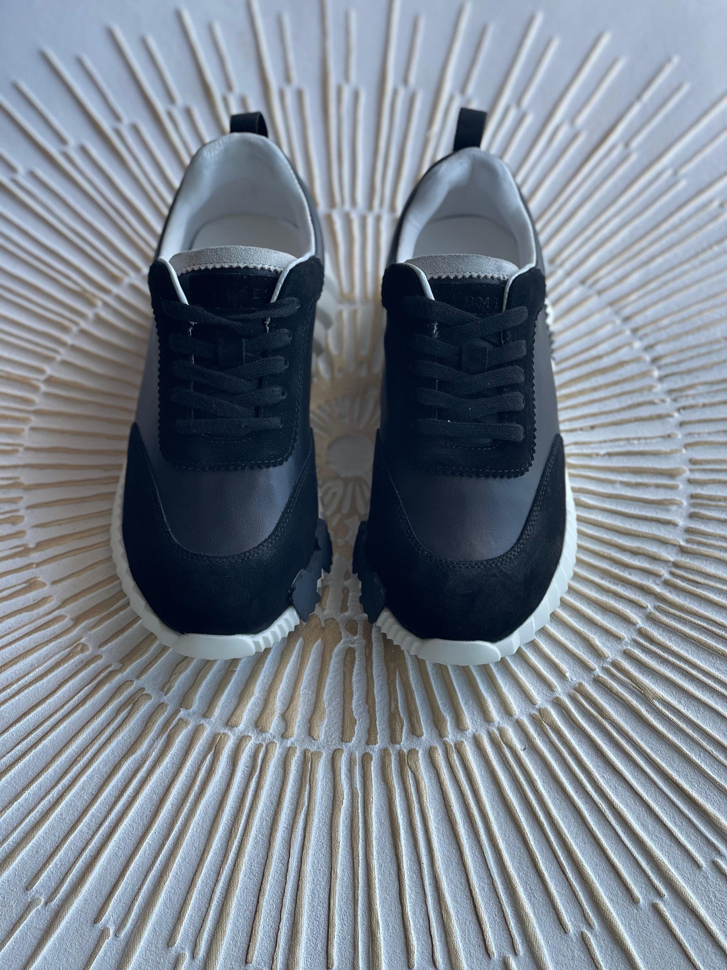Hermès Bouncing Sneaker – Black Leather & Suede Low-Top with Oversized H Motif