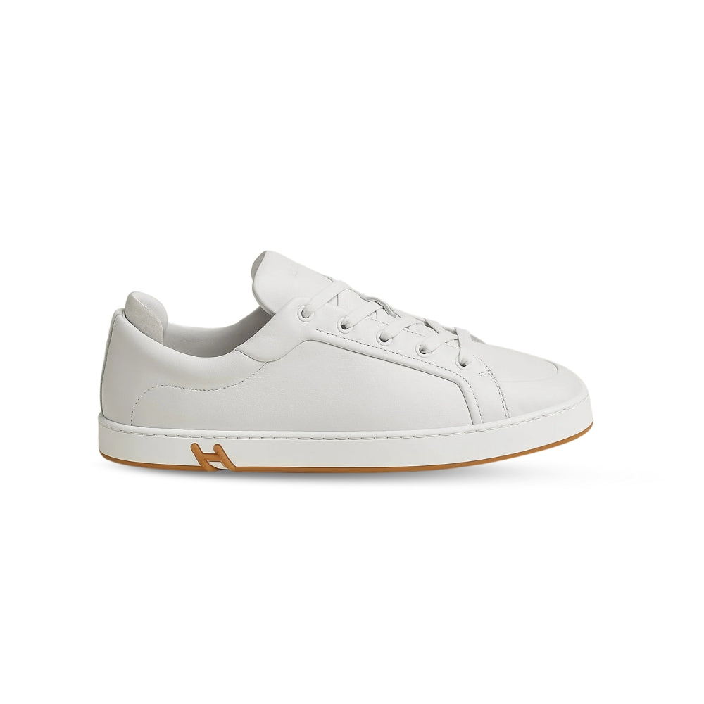 Hermès Kid Sneaker in White Calfskin & Suede – Sleek Urban Luxury.