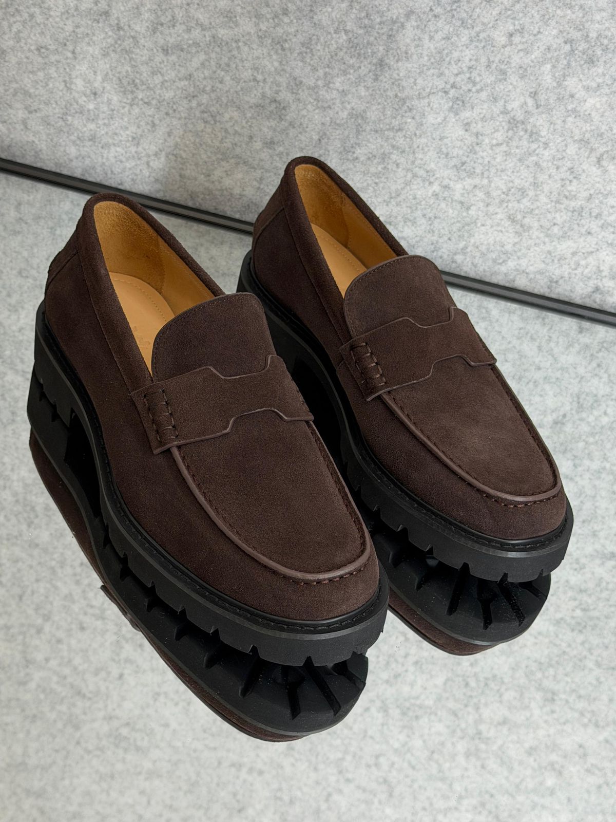 Hermès Klement loafer, crafted from brown suede calfskin with a chunky rubber sole.