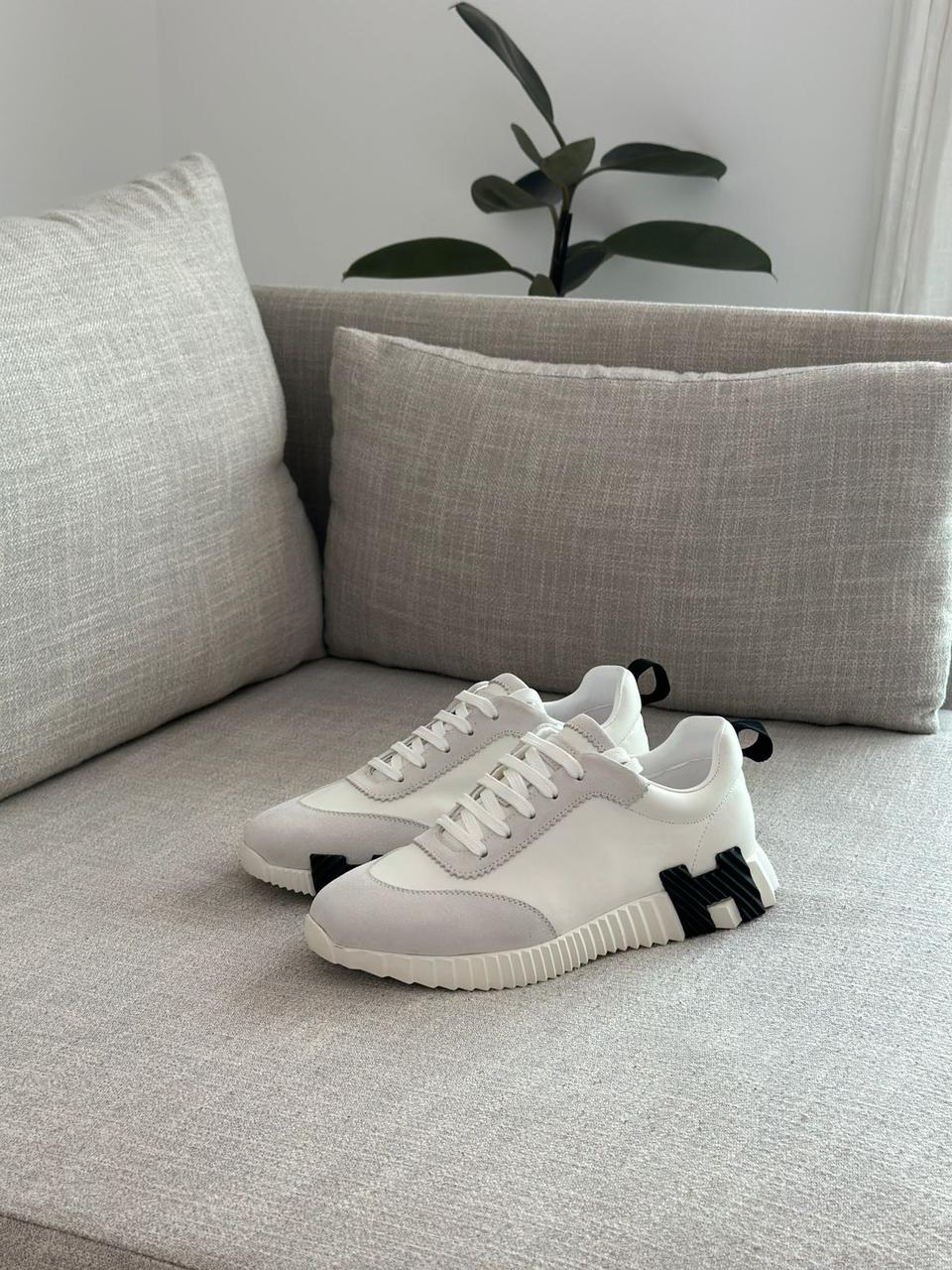 Hermès Bouncing Sneakers in white.