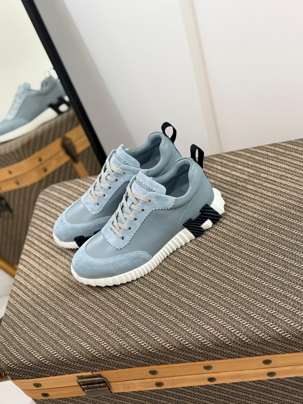 Hermès Bouncing sneaker, crafted in calfskin and suede goatskin with a contrasting rubber sole.