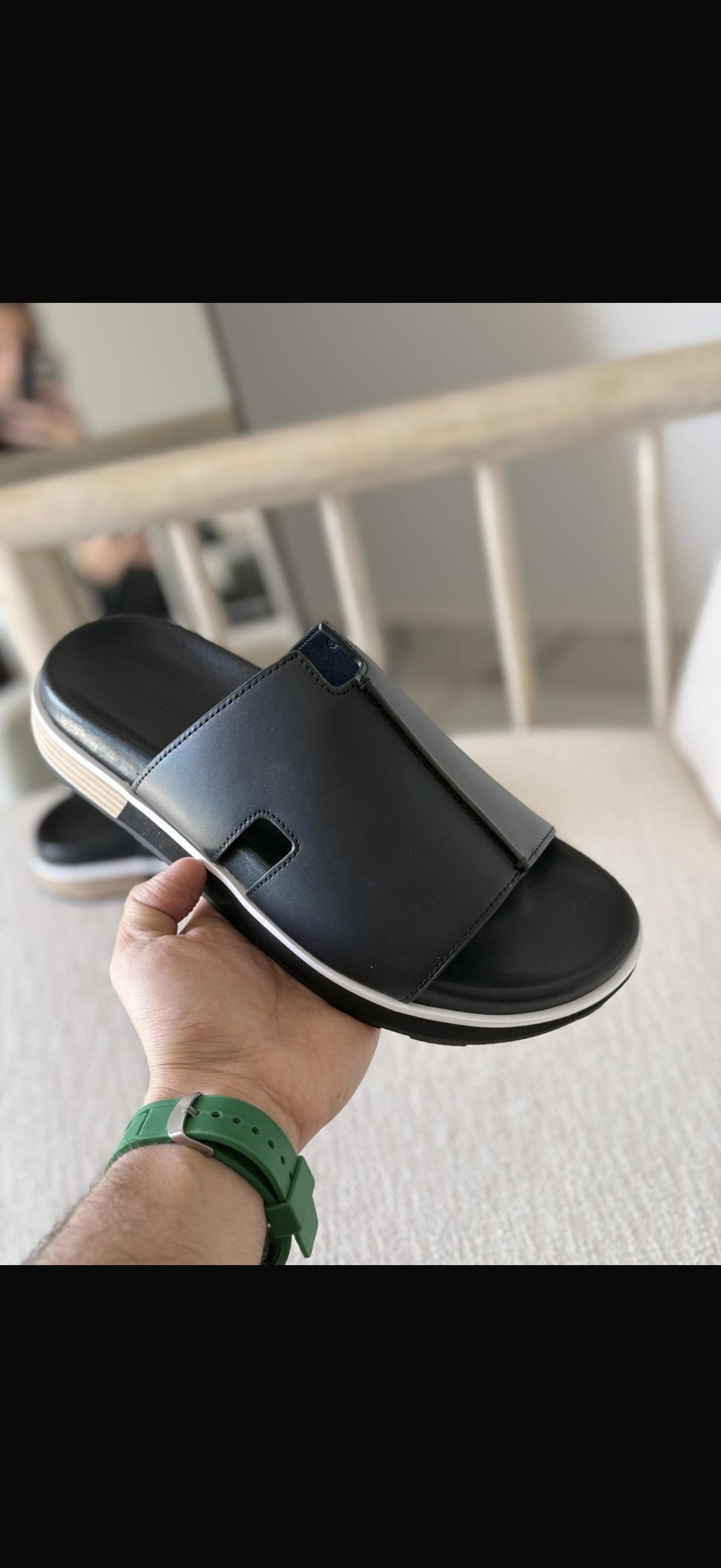 Hermès Pharaon sandals in black.