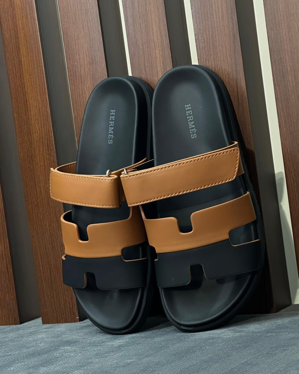 Hermès Chypre sandals H cut-out  leather strap.