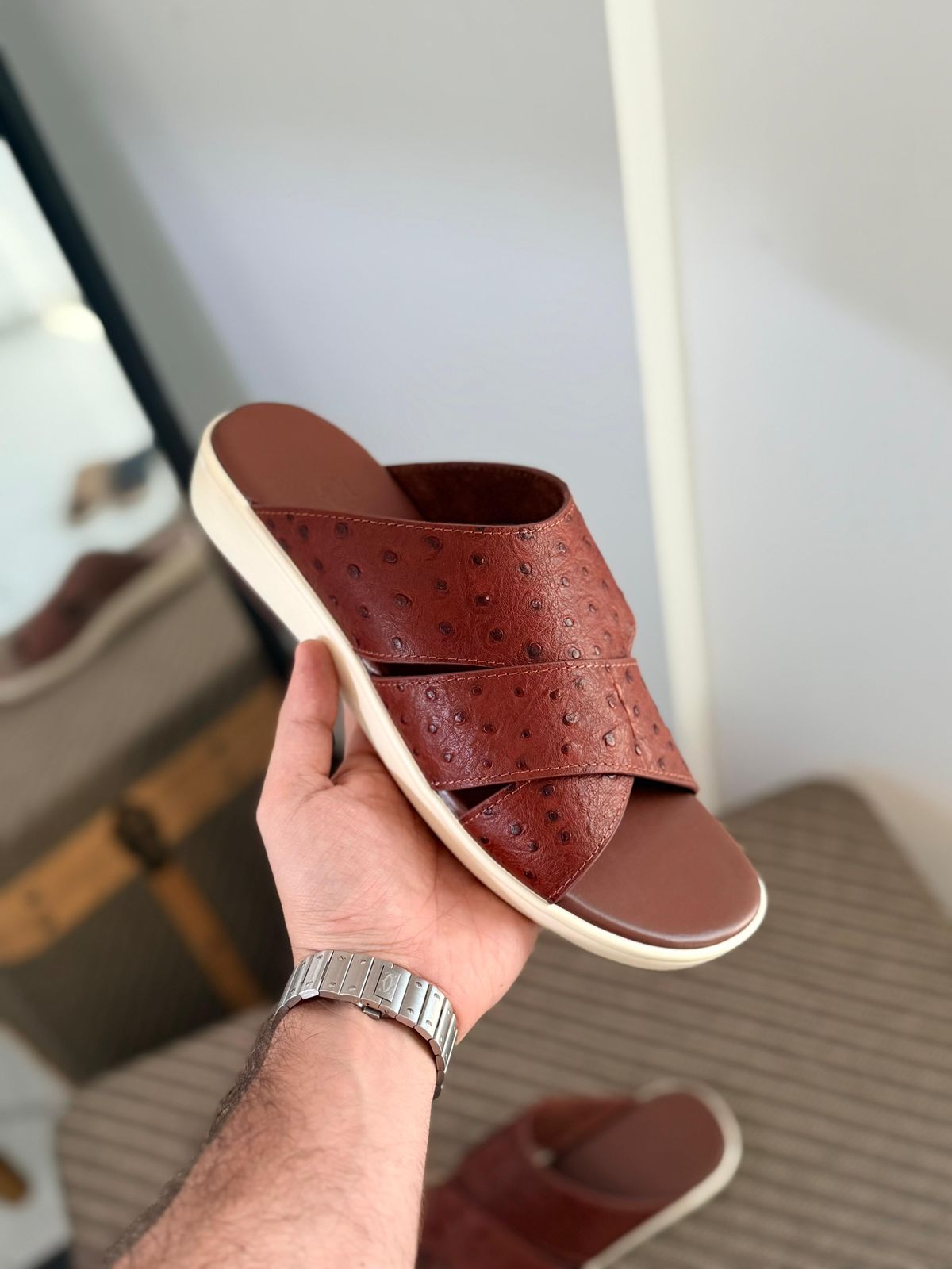 Loro Piana Palm Walk Sandals crafted from  ostrich leather.