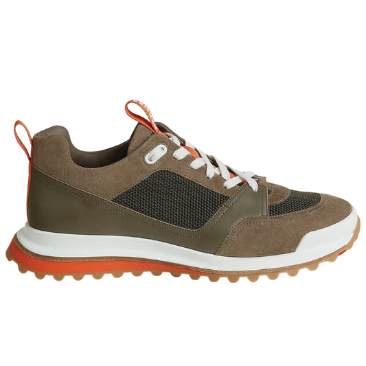 Hermès Leader Sneakers are crafted from a combination of technical twill, calfskin, and suede goatskin.