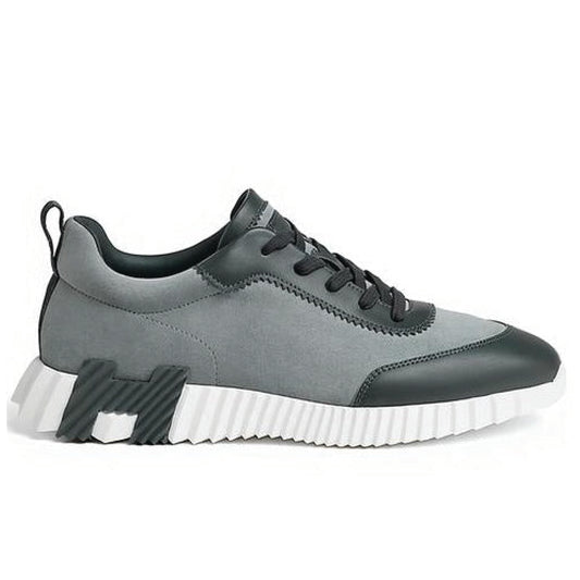 Hermès Bouncing Sneakers in the Gris Orage colorway, crafted from suede goatskin and calfskin.