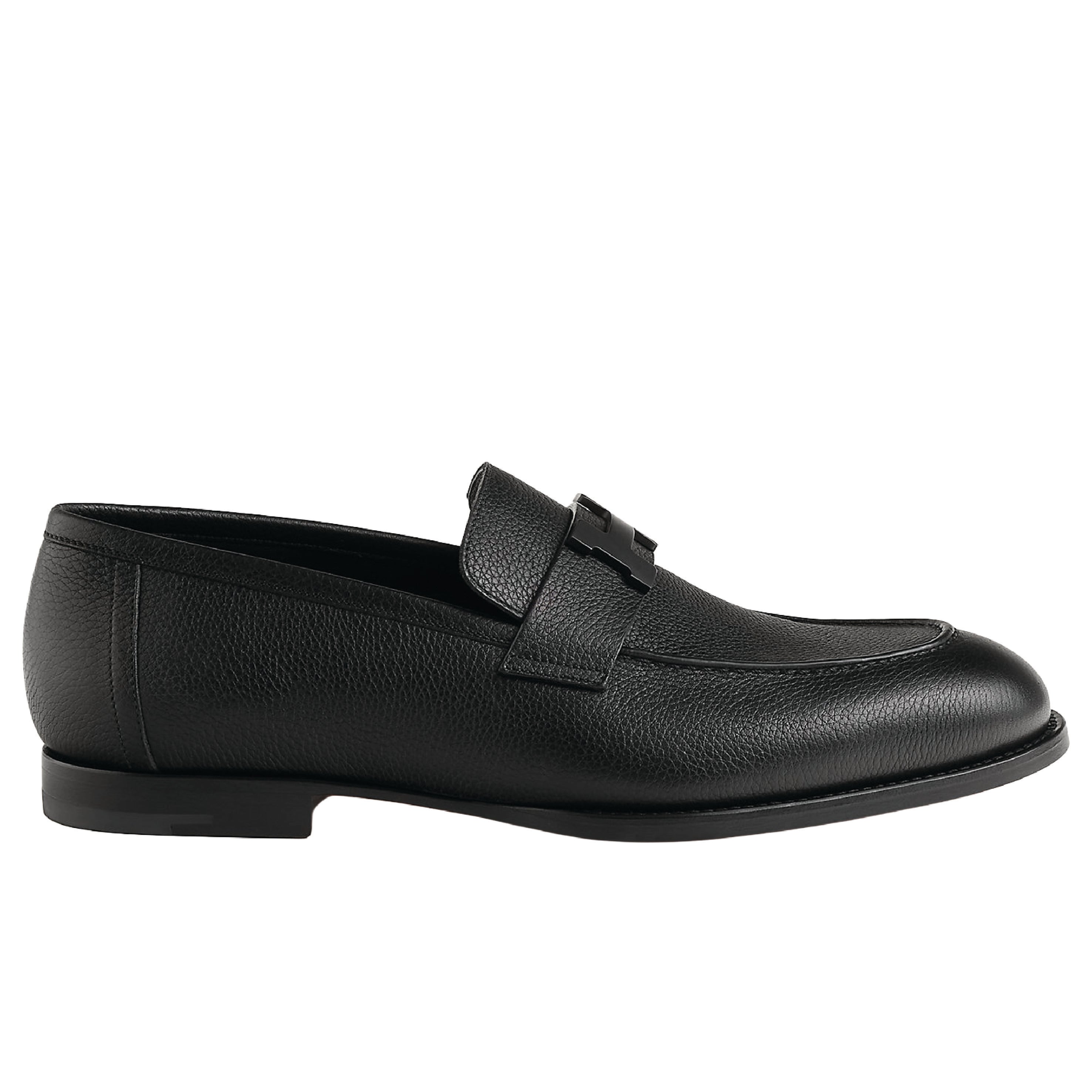 Hermès Paris loafers, a classic slip-on shoe crafted in black grained ...
