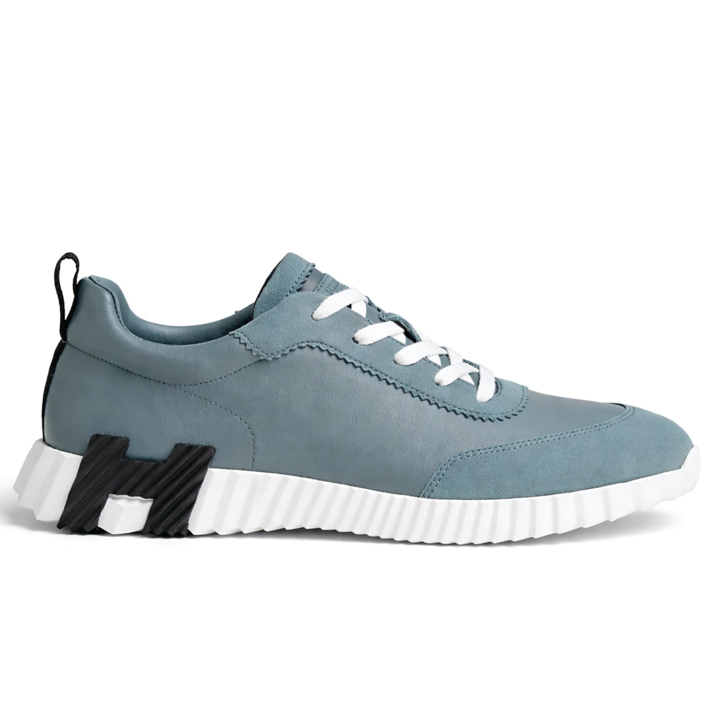 Hermès Bouncing sneaker, crafted in calfskin and suede goatskin with a contrasting rubber sole.