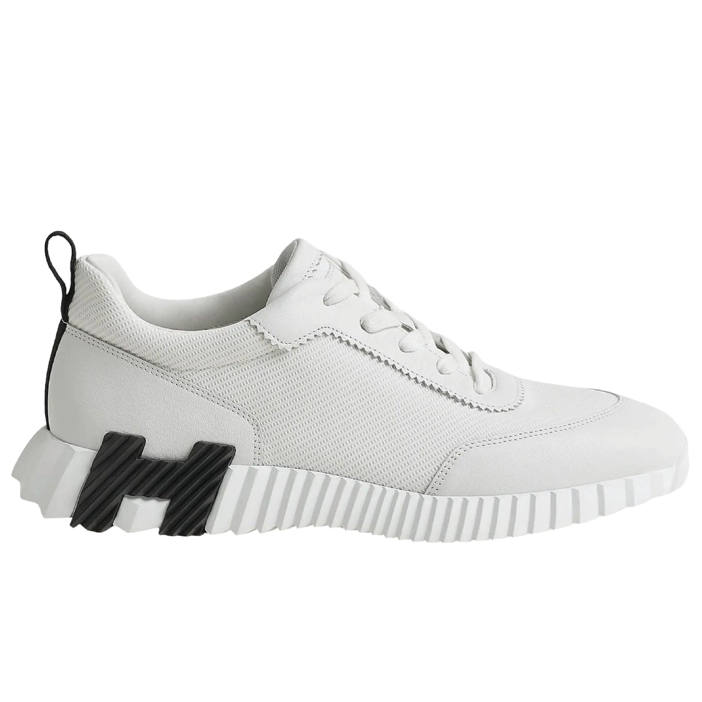 Hermès Bouncing sneaker, a luxury footwear option featuring a distinctive oversized "H" motif on the sole.