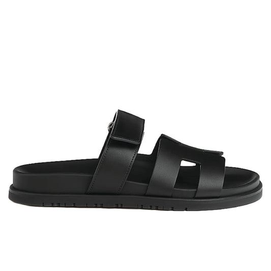 Hermès Chypre sandals in black calfskin leather.