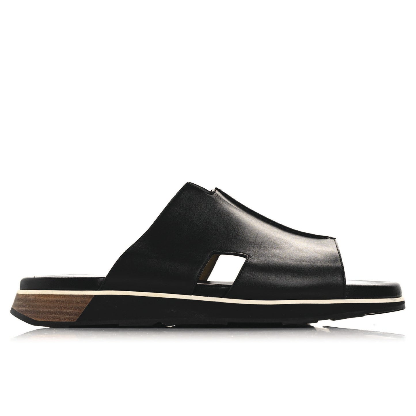 Hermès Pharaon sandals in black.